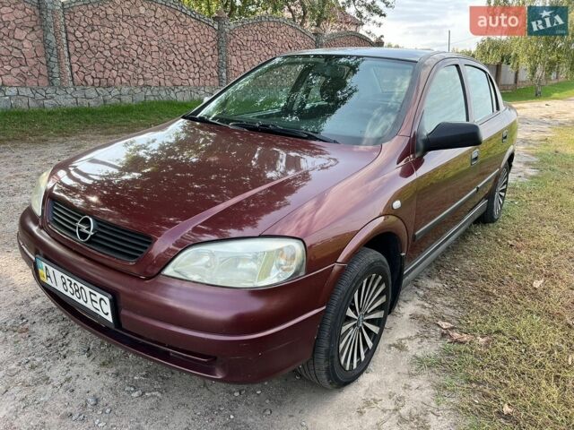 Красный Опель Астра, объемом двигателя 1.4 л и пробегом 195 тыс. км за 2750 $, фото 1 на Automoto.ua