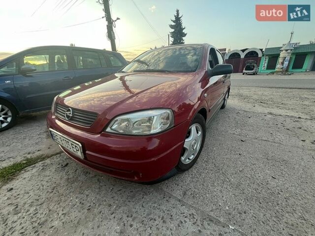 Красный Опель Астра, объемом двигателя 1.36 л и пробегом 270 тыс. км за 3100 $, фото 1 на Automoto.ua
