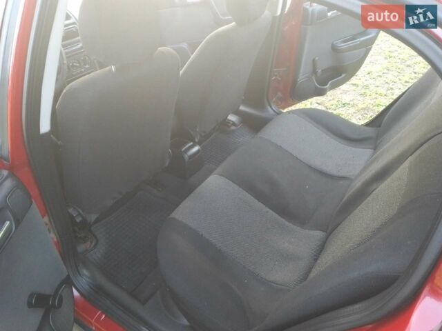 Червоний Опель Астра, об'ємом двигуна 1.6 л та пробігом 220 тис. км за 3900 $, фото 1 на Automoto.ua