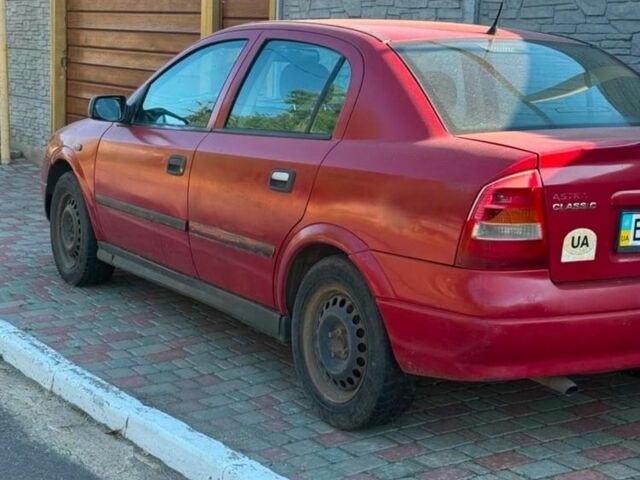 Червоний Опель Астра, об'ємом двигуна 1.4 л та пробігом 300 тис. км за 1303 $, фото 1 на Automoto.ua