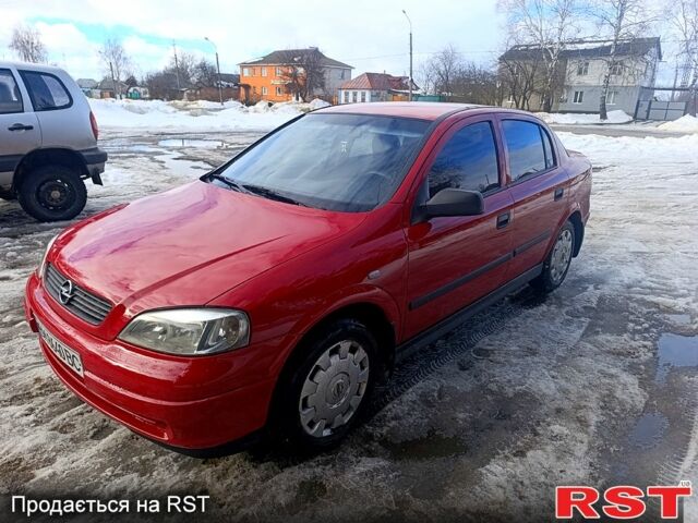 Красный Опель Астра, объемом двигателя 1.4 л и пробегом 199 тыс. км за 4150 $, фото 1 на Automoto.ua