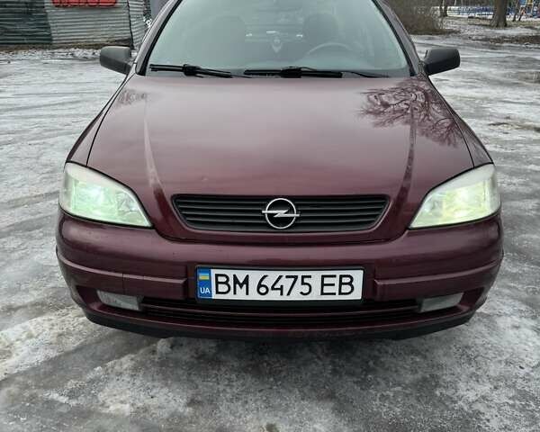 Красный Опель Астра, объемом двигателя 1.4 л и пробегом 100 тыс. км за 3500 $, фото 1 на Automoto.ua