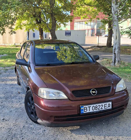 Красный Опель Астра, объемом двигателя 1.4 л и пробегом 229 тыс. км за 4900 $, фото 1 на Automoto.ua