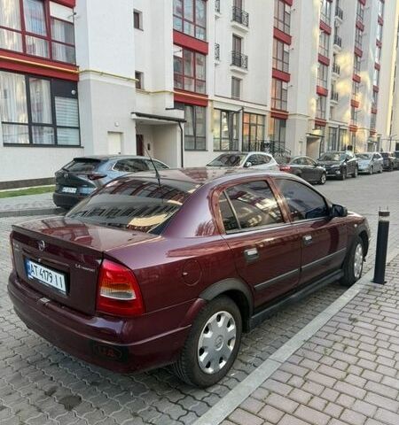 Червоний Опель Астра, об'ємом двигуна 1.4 л та пробігом 382 тис. км за 2800 $, фото 1 на Automoto.ua