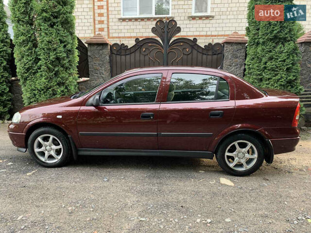 Красный Опель Астра, объемом двигателя 0 л и пробегом 88 тыс. км за 5000 $, фото 1 на Automoto.ua