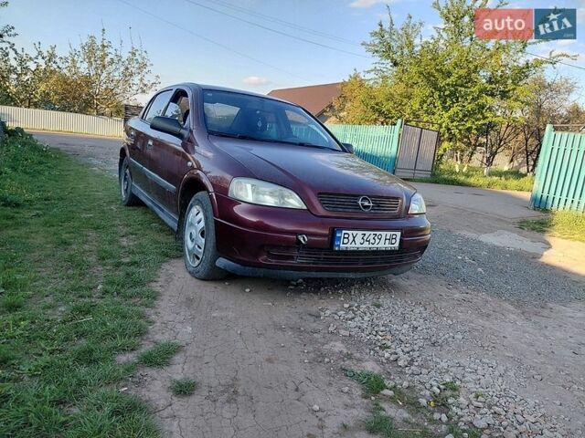 Красный Опель Астра, объемом двигателя 1.39 л и пробегом 195 тыс. км за 2200 $, фото 1 на Automoto.ua