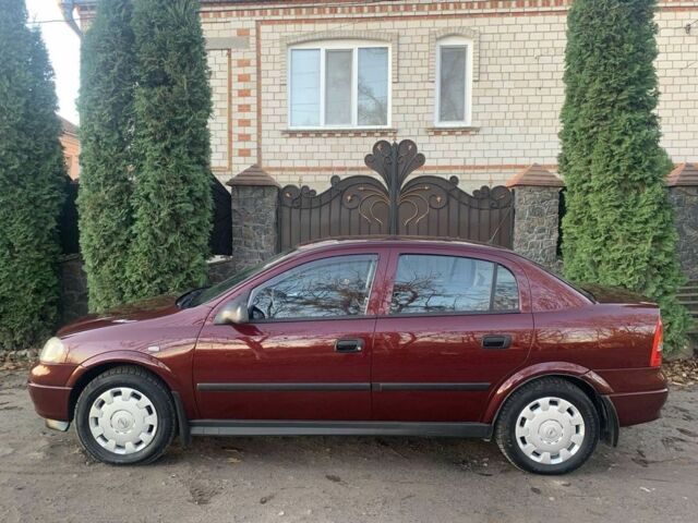 Красный Опель Астра, объемом двигателя 1.4 л и пробегом 90 тыс. км за 4500 $, фото 1 на Automoto.ua