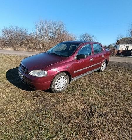 Червоний Опель Астра, об'ємом двигуна 1.6 л та пробігом 172 тис. км за 3000 $, фото 1 на Automoto.ua