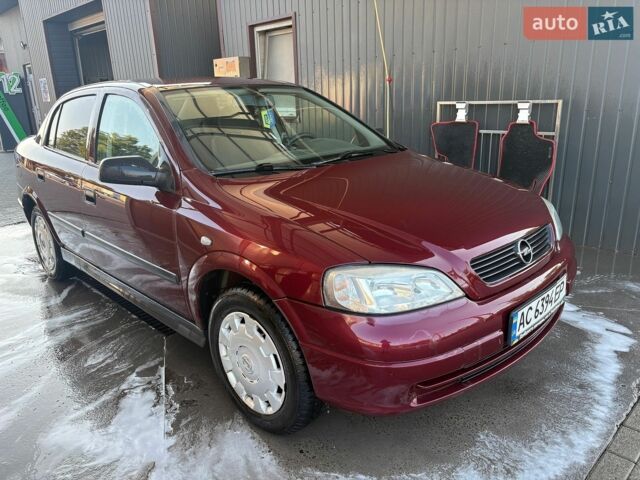Красный Опель Астра, объемом двигателя 1.4 л и пробегом 172 тыс. км за 2800 $, фото 1 на Automoto.ua