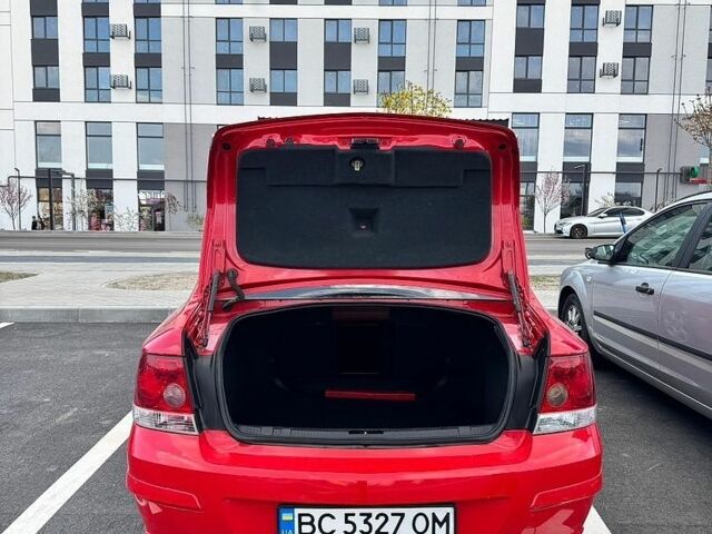Красный Опель Астра, объемом двигателя 1.69 л и пробегом 251 тыс. км за 4500 $, фото 1 на Automoto.ua