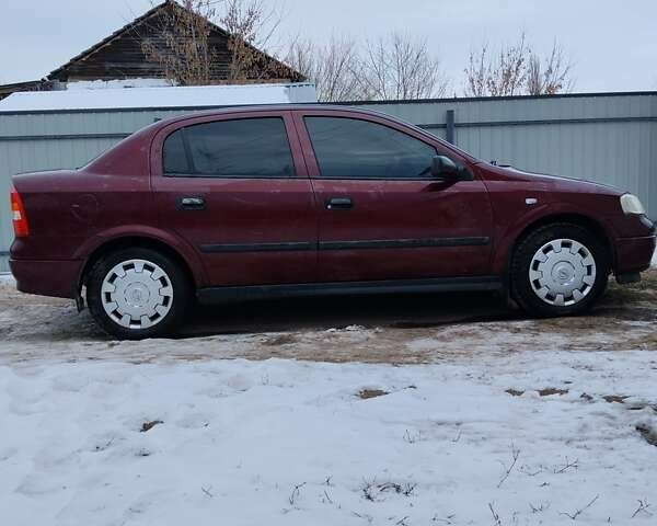 Червоний Опель Астра, об'ємом двигуна 1.4 л та пробігом 200 тис. км за 4100 $, фото 1 на Automoto.ua