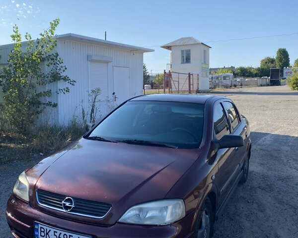 Красный Опель Астра, объемом двигателя 1.6 л и пробегом 233 тыс. км за 3300 $, фото 1 на Automoto.ua