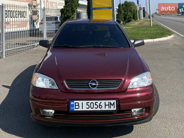 Красный Опель Астра, объемом двигателя 1.36 л и пробегом 173 тыс. км за 5500 $, фото 1 на Automoto.ua