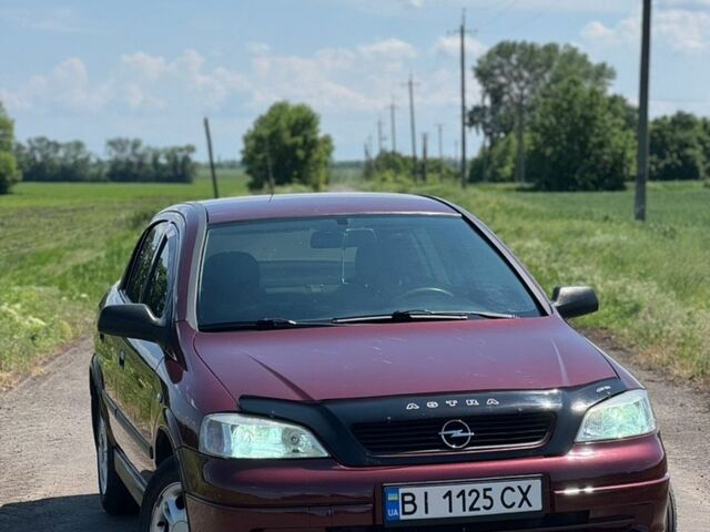 Червоний Опель Астра, об'ємом двигуна 1.6 л та пробігом 186 тис. км за 4200 $, фото 1 на Automoto.ua