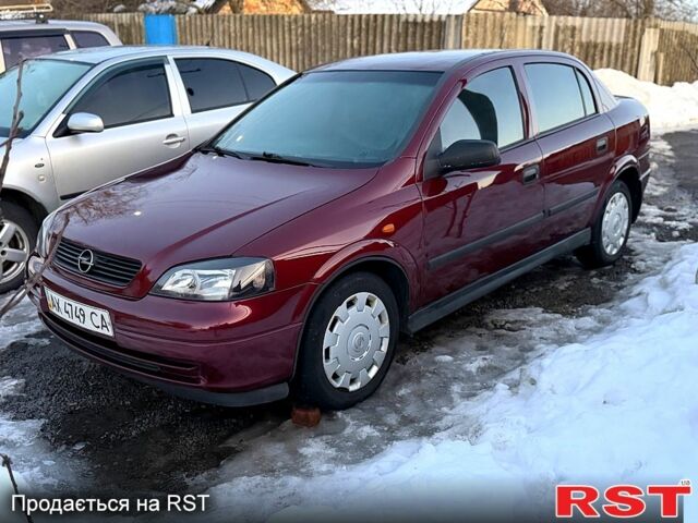 Красный Опель Астра, объемом двигателя 1.4 л и пробегом 150 тыс. км за 3850 $, фото 1 на Automoto.ua