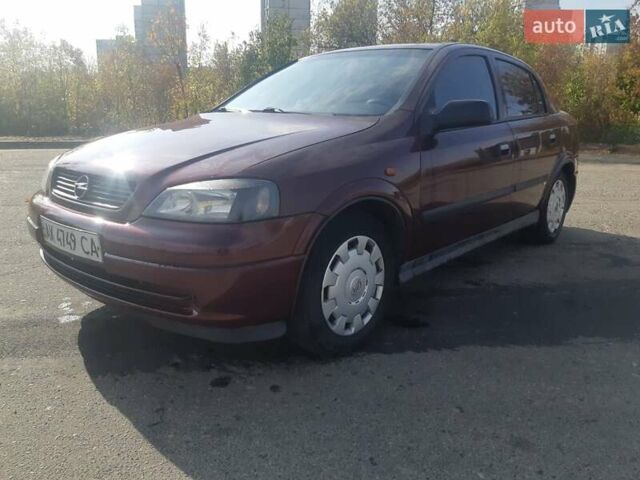 Красный Опель Астра, объемом двигателя 1.4 л и пробегом 320 тыс. км за 3450 $, фото 1 на Automoto.ua