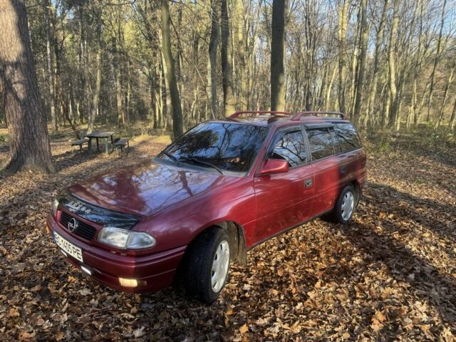 Красный Опель Астра, объемом двигателя 1.7 л и пробегом 413 тыс. км за 2450 $, фото 1 на Automoto.ua