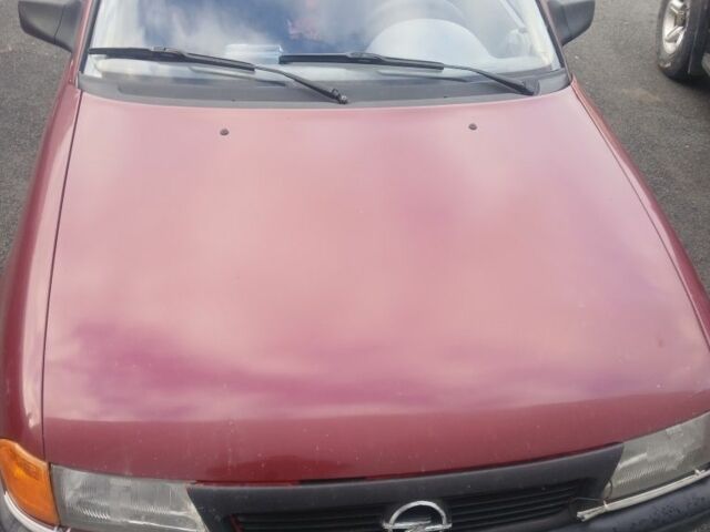 Красный Опель Астра, объемом двигателя 1.6 л и пробегом 307 тыс. км за 1800 $, фото 1 на Automoto.ua