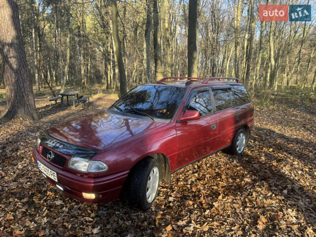 Красный Опель Астра, объемом двигателя 1.7 л и пробегом 413 тыс. км за 2450 $, фото 1 на Automoto.ua