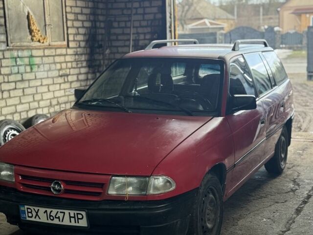Красный Опель Астра, объемом двигателя 1.4 л и пробегом 294 тыс. км за 1500 $, фото 1 на Automoto.ua