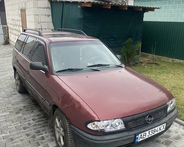 Красный Опель Астра, объемом двигателя 1.6 л и пробегом 387 тыс. км за 1700 $, фото 1 на Automoto.ua