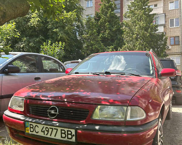 Червоний Опель Астра, об'ємом двигуна 1.6 л та пробігом 388 тис. км за 1900 $, фото 1 на Automoto.ua