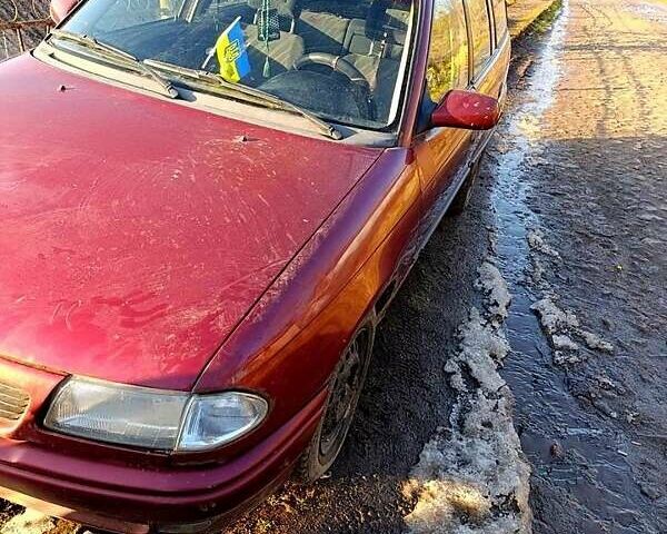 Червоний Опель Астра, об'ємом двигуна 1.6 л та пробігом 256 тис. км за 1000 $, фото 1 на Automoto.ua