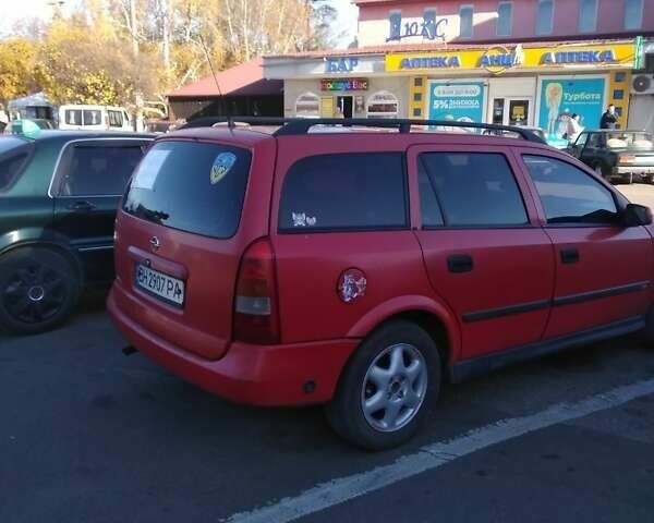 Красный Опель Астра, объемом двигателя 1.6 л и пробегом 250 тыс. км за 2600 $, фото 1 на Automoto.ua