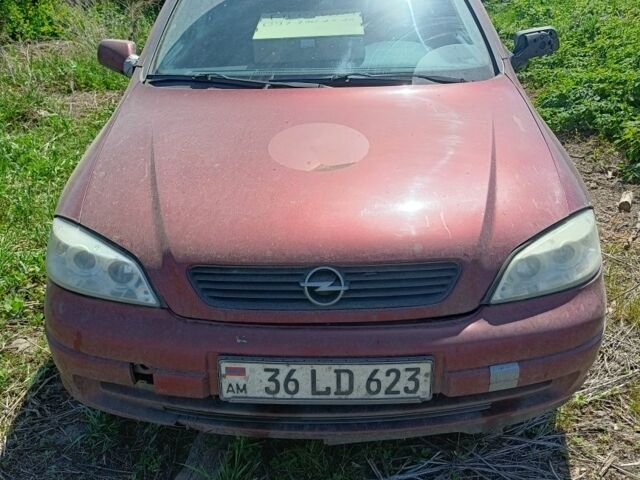 Красный Опель Астра, объемом двигателя 1.6 л и пробегом 255 тыс. км за 1450 $, фото 1 на Automoto.ua
