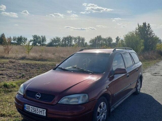 Красный Опель Астра, объемом двигателя 1.4 л и пробегом 290 тыс. км за 2200 $, фото 1 на Automoto.ua