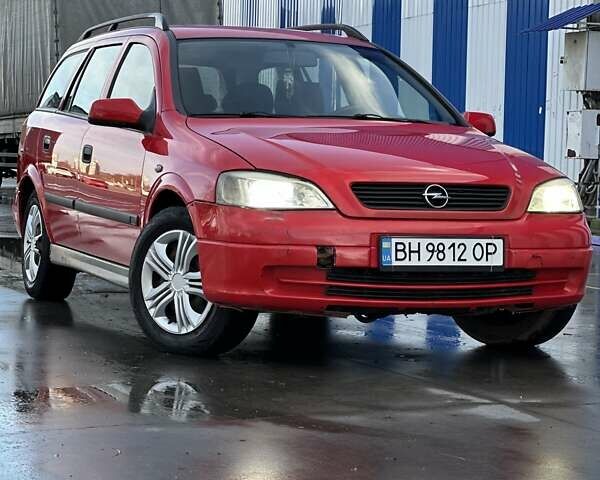 Красный Опель Астра, объемом двигателя 2 л и пробегом 250 тыс. км за 2699 $, фото 1 на Automoto.ua