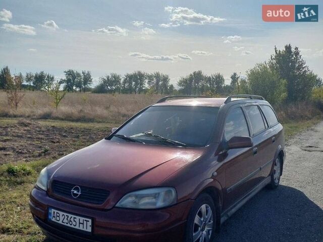 Красный Опель Астра, объемом двигателя 1.4 л и пробегом 290 тыс. км за 2200 $, фото 1 на Automoto.ua