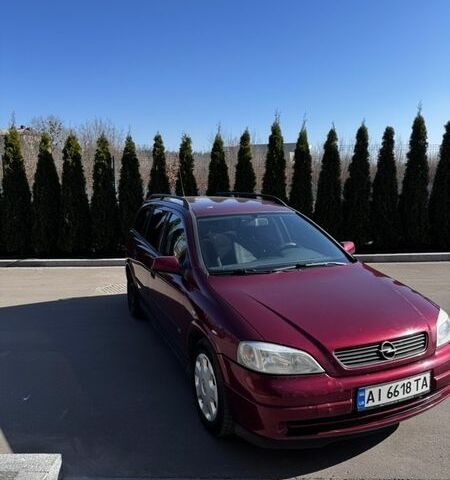 Червоний Опель Астра, об'ємом двигуна 1.6 л та пробігом 248 тис. км за 3850 $, фото 1 на Automoto.ua