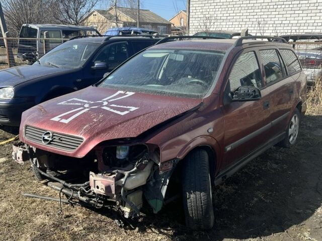 Красный Опель Астра, объемом двигателя 2 л и пробегом 200 тыс. км за 300 $, фото 1 на Automoto.ua