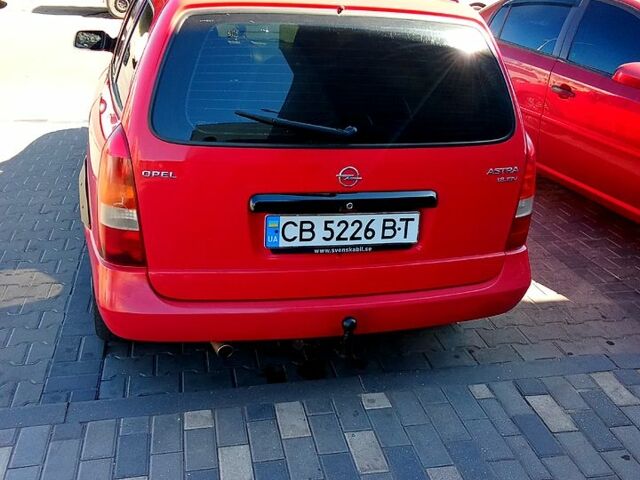 Красный Опель Астра, объемом двигателя 1.8 л и пробегом 256 тыс. км за 2200 $, фото 1 на Automoto.ua