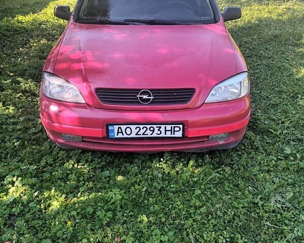 Красный Опель Астра, объемом двигателя 1.7 л и пробегом 280 тыс. км за 3000 $, фото 1 на Automoto.ua