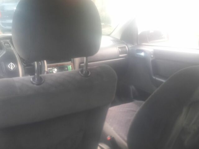 Красный Опель Астра, объемом двигателя 1.6 л и пробегом 280 тыс. км за 2000 $, фото 1 на Automoto.ua