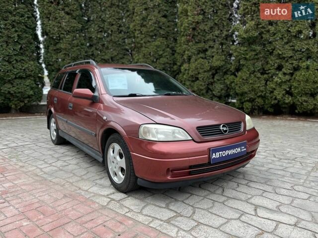 Красный Опель Астра, объемом двигателя 1.6 л и пробегом 266 тыс. км за 3500 $, фото 1 на Automoto.ua
