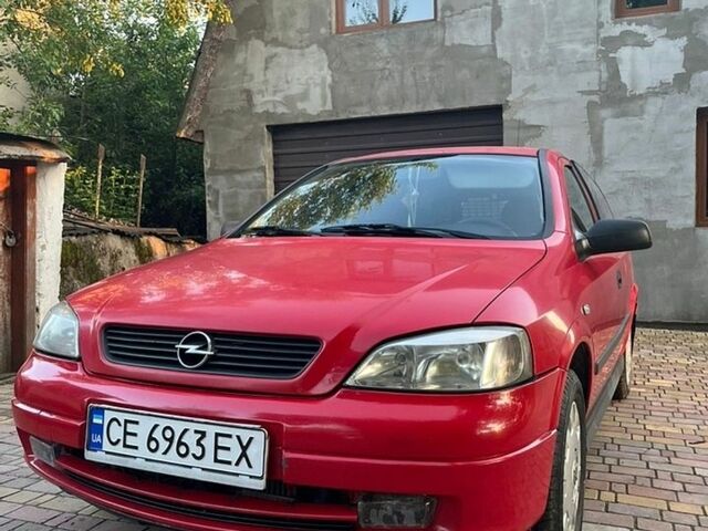 Красный Опель Астра, объемом двигателя 1.7 л и пробегом 312 тыс. км за 2500 $, фото 1 на Automoto.ua