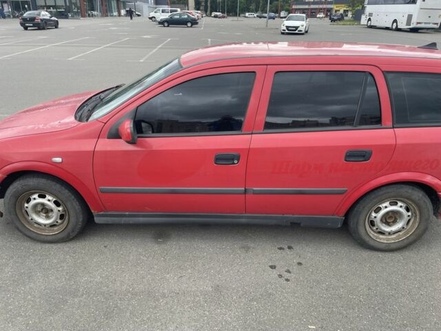 Красный Опель Астра, объемом двигателя 1.4 л и пробегом 311 тыс. км за 2450 $, фото 1 на Automoto.ua