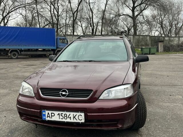 Червоний Опель Астра, об'ємом двигуна 2 л та пробігом 450 тис. км за 2700 $, фото 1 на Automoto.ua