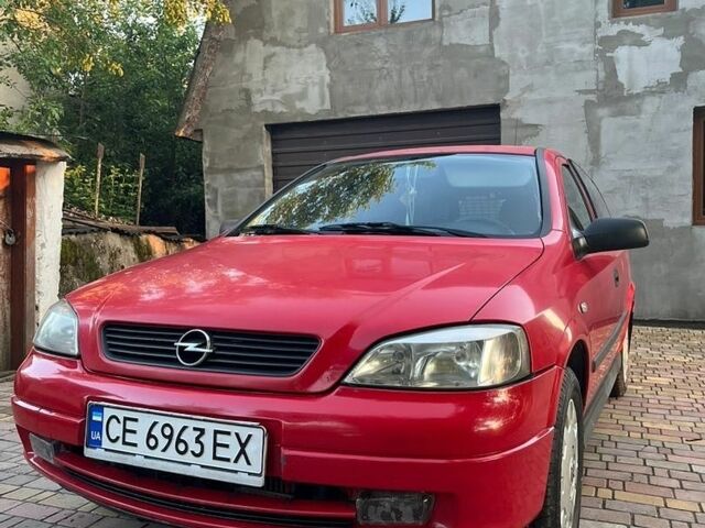 Красный Опель Астра, объемом двигателя 1.69 л и пробегом 316 тыс. км за 2300 $, фото 1 на Automoto.ua