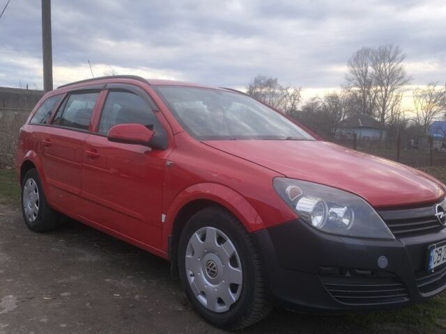 Красный Опель Астра, объемом двигателя 1.7 л и пробегом 260 тыс. км за 4200 $, фото 1 на Automoto.ua