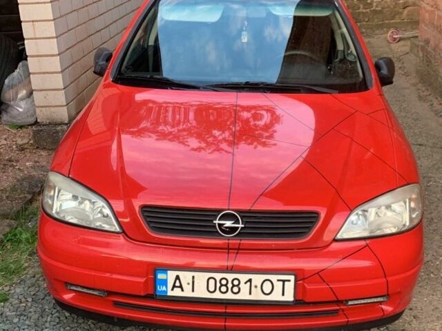 Красный Опель Астра, объемом двигателя 1.7 л и пробегом 390 тыс. км за 1124 $, фото 1 на Automoto.ua
