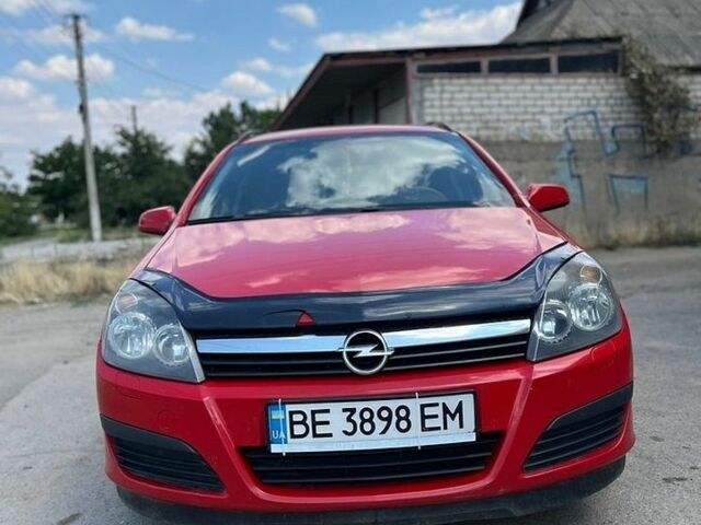 Червоний Опель Астра, об'ємом двигуна 1.25 л та пробігом 380 тис. км за 4250 $, фото 1 на Automoto.ua