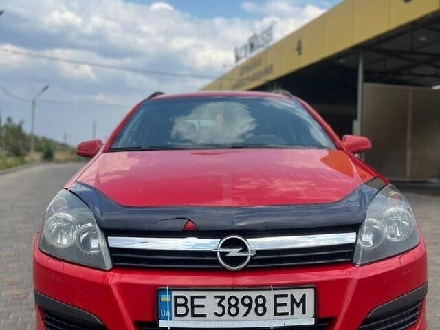 Червоний Опель Астра, об'ємом двигуна 1.25 л та пробігом 380 тис. км за 3500 $, фото 1 на Automoto.ua