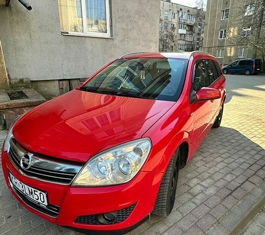 Красный Опель Астра, объемом двигателя 1.9 л и пробегом 356 тыс. км за 2500 $, фото 1 на Automoto.ua