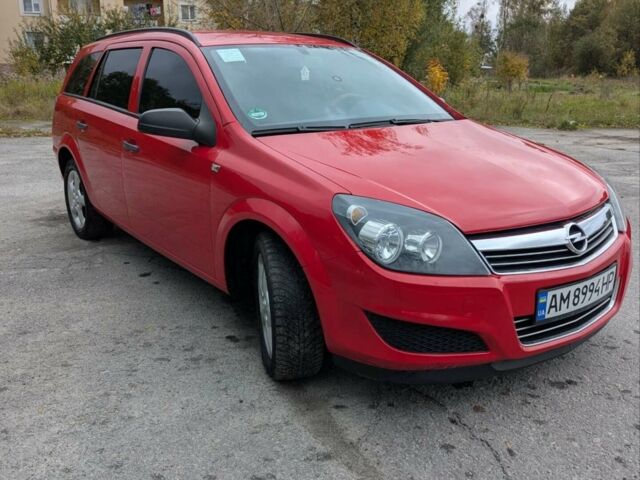 Червоний Опель Астра, об'ємом двигуна 1.4 л та пробігом 221 тис. км за 4699 $, фото 1 на Automoto.ua