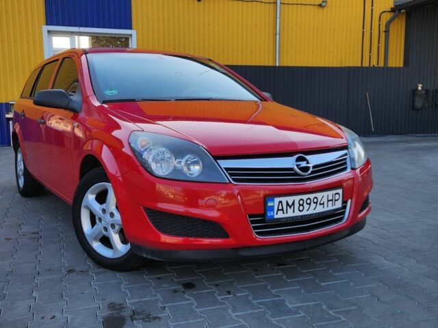 Красный Опель Астра, объемом двигателя 1.4 л и пробегом 217 тыс. км за 4950 $, фото 1 на Automoto.ua