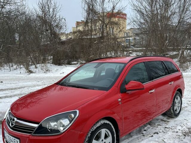 Красный Опель Астра, объемом двигателя 1.2 л и пробегом 240 тыс. км за 6000 $, фото 1 на Automoto.ua